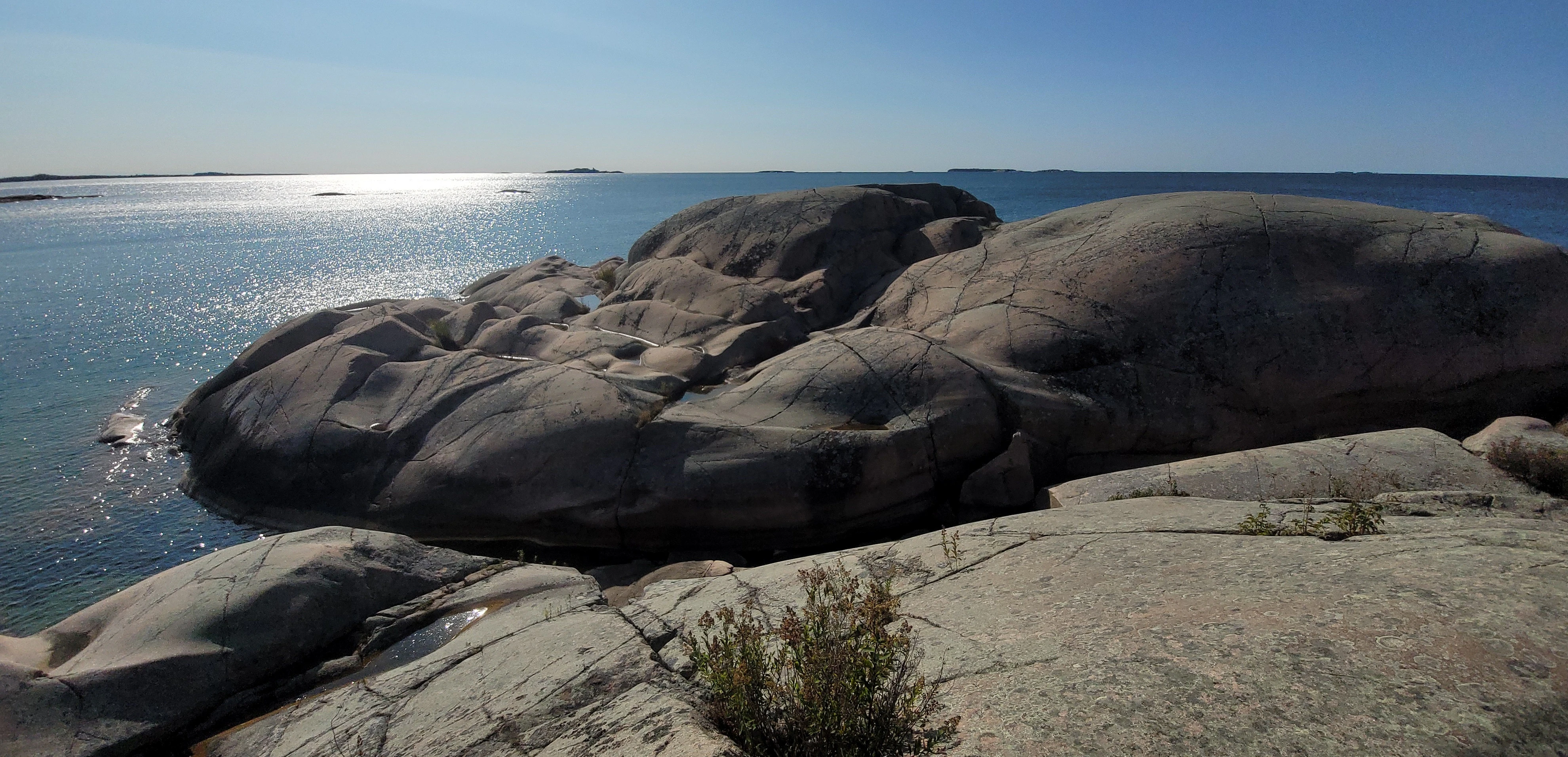 Smooth granite rocks from glacial erosion on Martins Island in the thirty thousand islands archipelago of the georgian bay